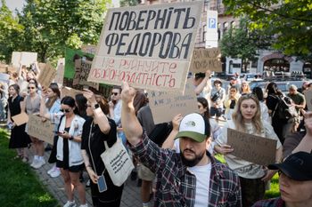 Ukranians gather to denounce President Volodymyr Zelenskyy's decision to dismiss Defense Minister Mykhailo Fedorov after six months in the post, Kyiv, Ukraine, Thursday, July 16, 2026. Placard reads: Bring back Fedorov. Do not destroy defense capability. 