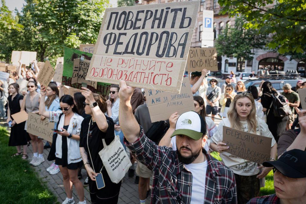AP Photo/Danylo Antoniuk Ukranians gather to denounce President Volodymyr Zelenskyy's decision to dismiss Defense Minister Mykhailo Fedorov after six months in the post, Kyiv, Ukraine, Thursday, July 16, 2026. Placard reads: Bring back Fedorov. Do not destroy defense capability.