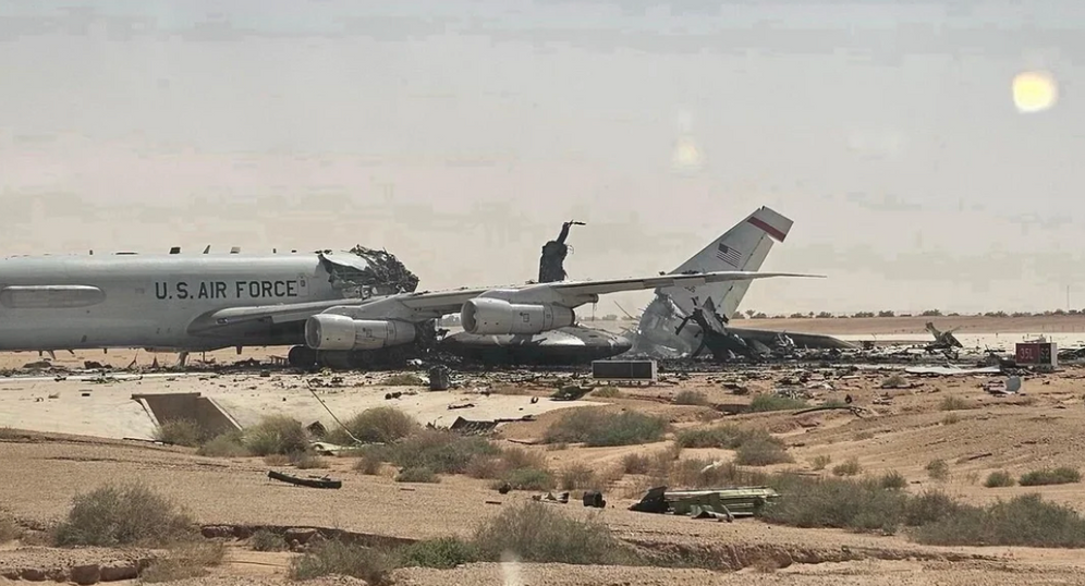 CBS News Undated photo of plane damaged by Iranian strikes at Prince Sultan AFB, Saudi Arabia.