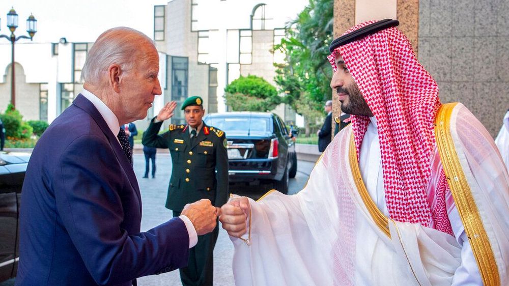 Saudi Crown Prince Mohammed bin Salman (R) greets U.S. President Joe Biden with a fist bump in Jeddah, Saudi Arabia.