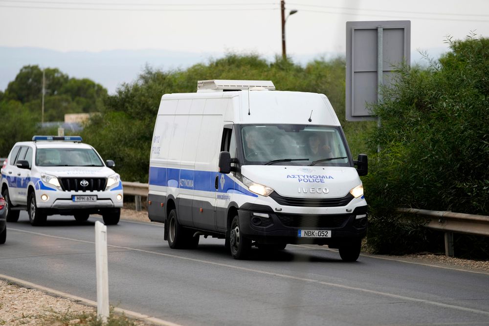 The police van carrying the five Israelis who are accused of raping a British woman arrives at the Famagusta District Courthouse in Paralimni, Cyprus.