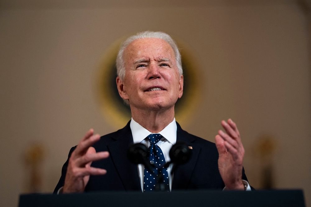 US President Joe Biden addresses the media at the Cross Hall of the White House in Washington, DC, on April 20, 2021.