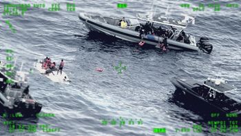 US Coast Guard, Customs and Border Protection and Puerto Rico Police units respond to a capsized vessel near Puerto Rico on May 12, 2022