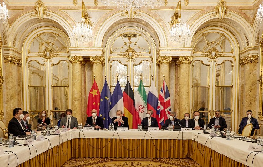 In this handout file photo taken and released on December 9, 2021 by the EU delegation in Vienna, EEAS shows representatives attending a meeting on the Iran nuclear deal in Vienna, Austria.