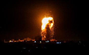 A ball of fire and smoke rises during Israeli airstrikes in the southern Gaza Strip, on August 3, 2020.