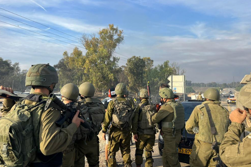 IDF soldiers heading to battle terrorists in Israeli communities on October 7, 2023
