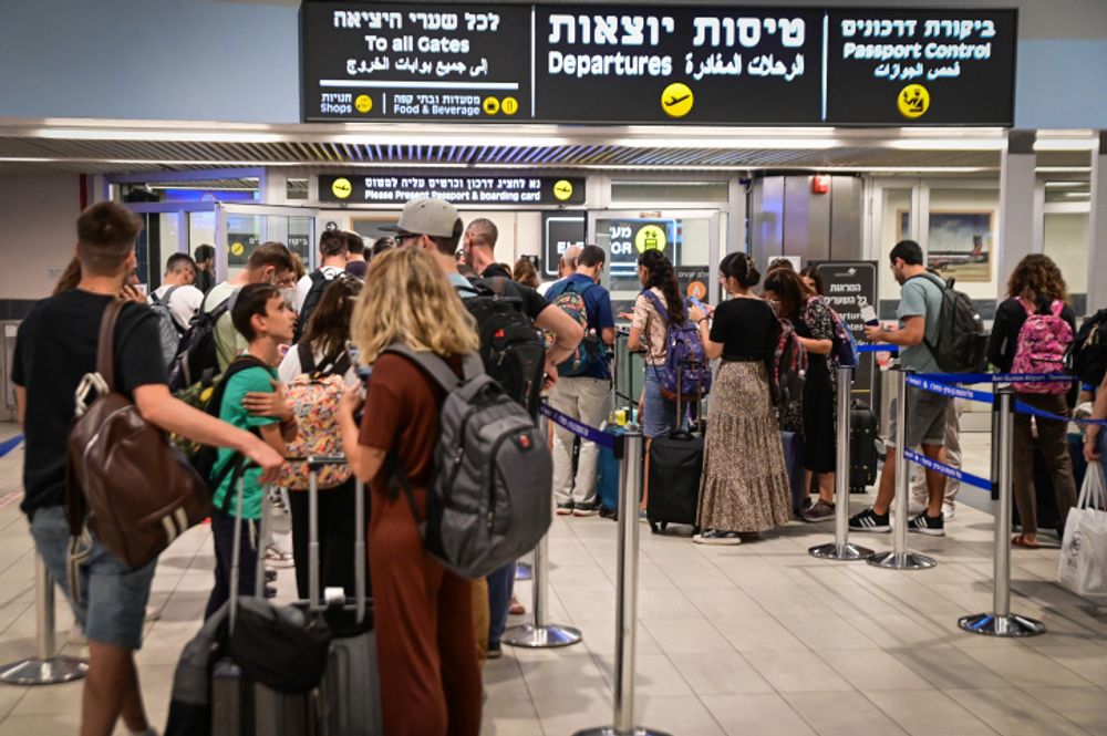 Travelers in line at the Ben Gurion International Airport, Israel, on July 7, 2022.