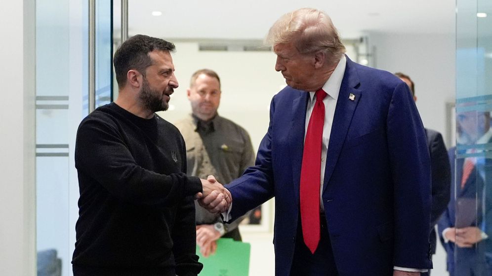 Then-Republican presidential nominee and current President Donald Trump (right) shakes hands with Ukraine's President Volodymyr Zelensky at Trump Tower, New York City