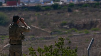 Israeli soldier looks over on south Lebanon, from the Northern Israeli border