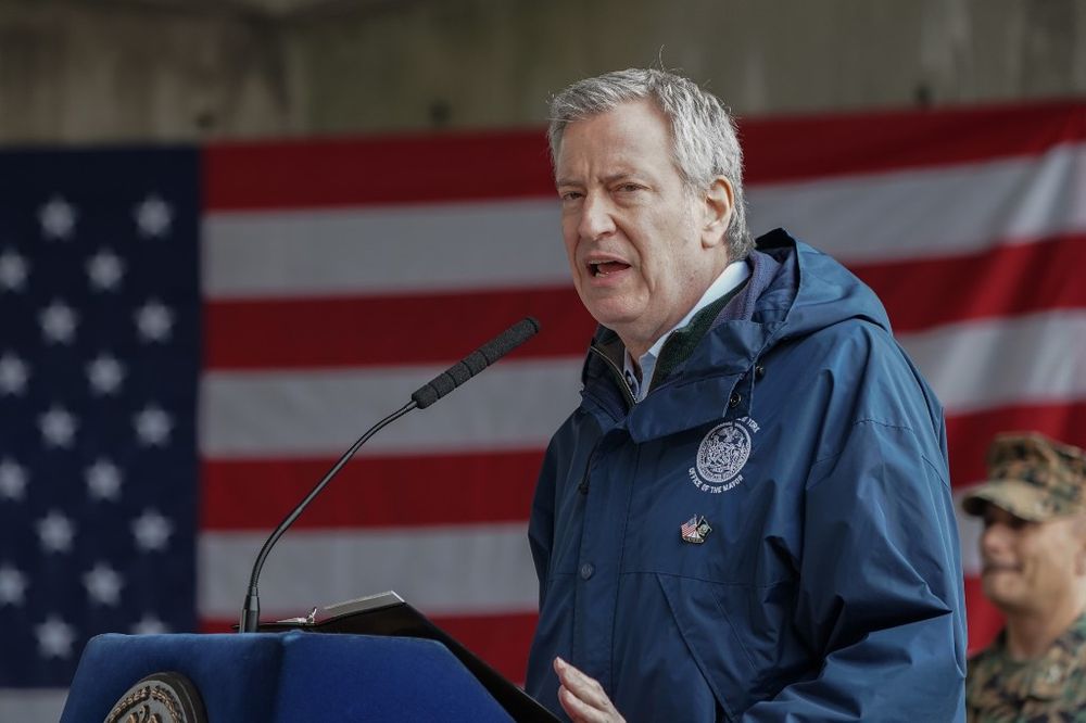 Then New York Mayor Bill de Blasio speaks at Pier 90 on March 30, 2020 in New York.