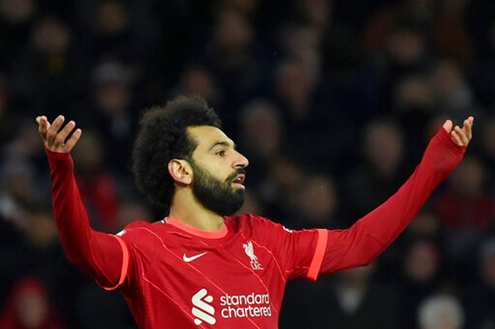 Liverpool's Mohamed Salah reacts during an English Premier League soccer match at the Molineux Stadium in Wolverhampton, England, December 4, 2021.