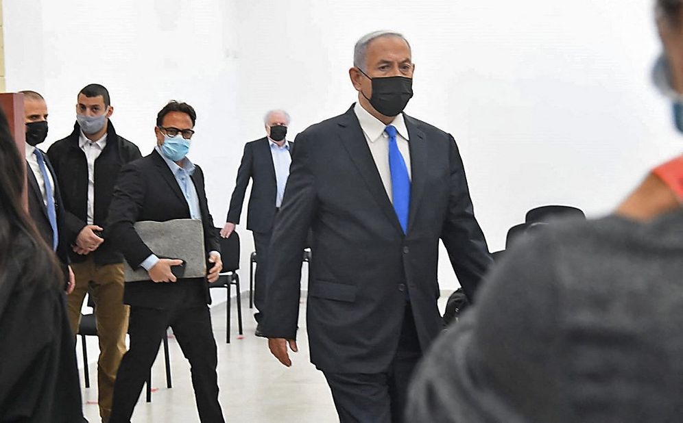 Israeli Prime Minister Benjamin Netanyahu arrives at a hearing in his corruption trial at the Jerusalem district court, on February 8, 2021.