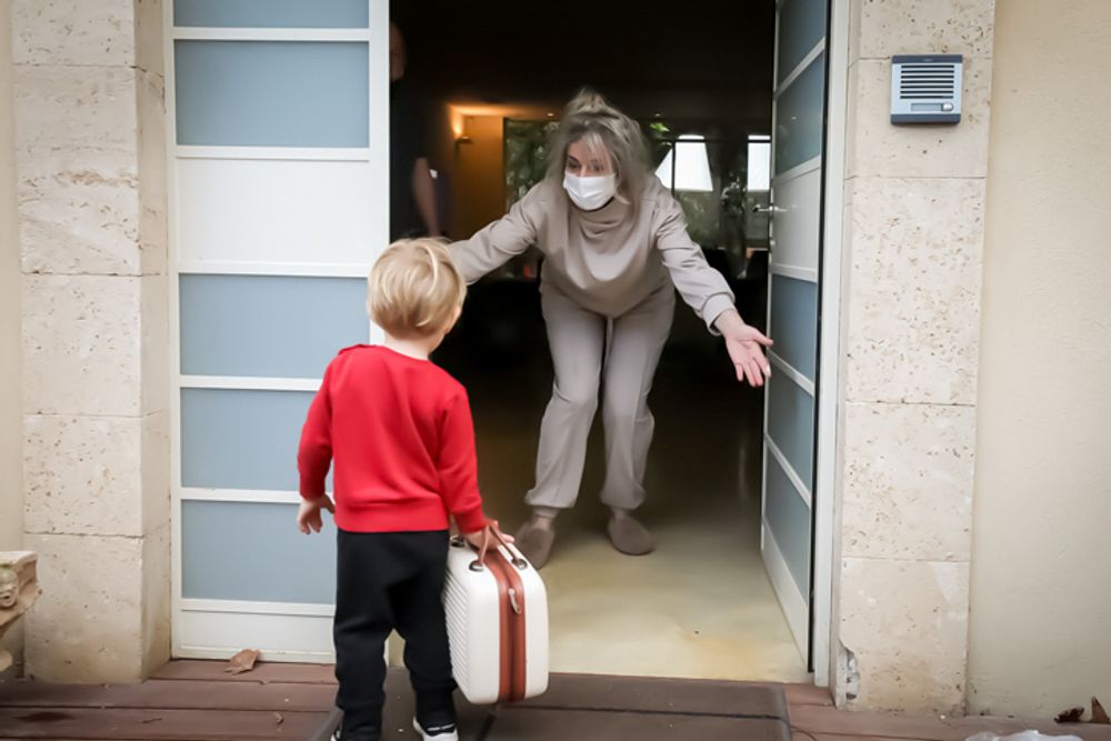 Grandparents meets with their grandchildren in their home in Ramat Gan, Israel, on February 5, 2021.