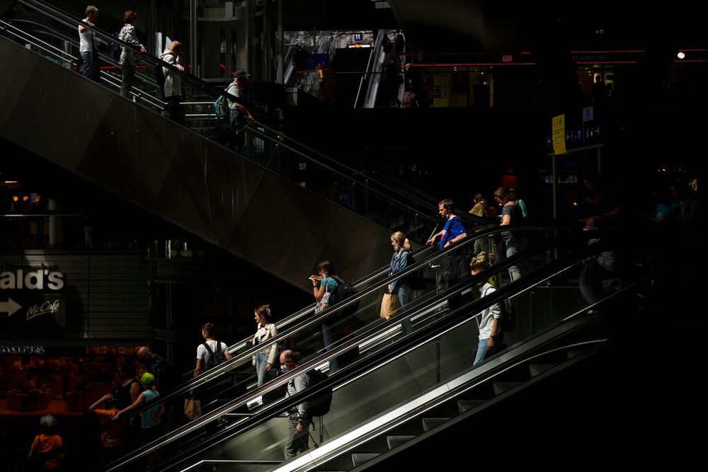 Travelers inside the main train station in Berlin, Germany, on June 16, 2022.