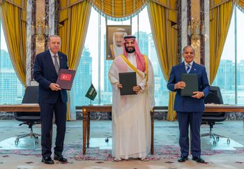 From left, Turkish President Recep Tayyip Erdogan, Saudi Crown Prince Mohammed bin Salman and Pakistani Prime Minister Shehbaz Sharif pose after signing a trilateral defense agreement in Mecca, Saudi Arabia, Friday, Aug. 7, 2026