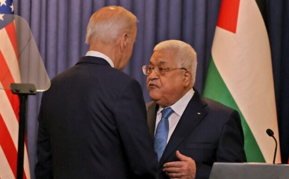 US President Joe Biden (L) and Palestinian Authority President Mahmud Abbas speak after their statements to the media in the city of Bethlehem, the West Bank.