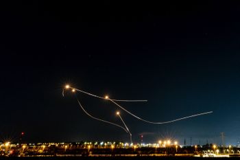 The Iron Dome air defense system fires interception missiles as rockets are fired from the Gaza Strip to Israel.