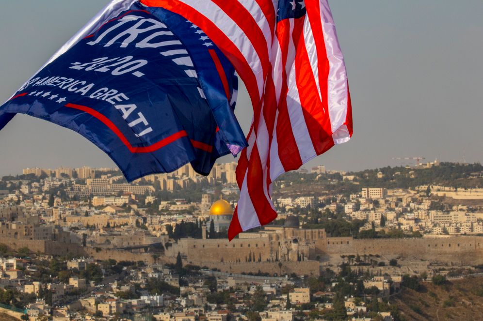 Israeli supporters of Donald Trumps wave US and Israeli flags to support his candidacy for the presidential in Jerusalem on October 27, 2020