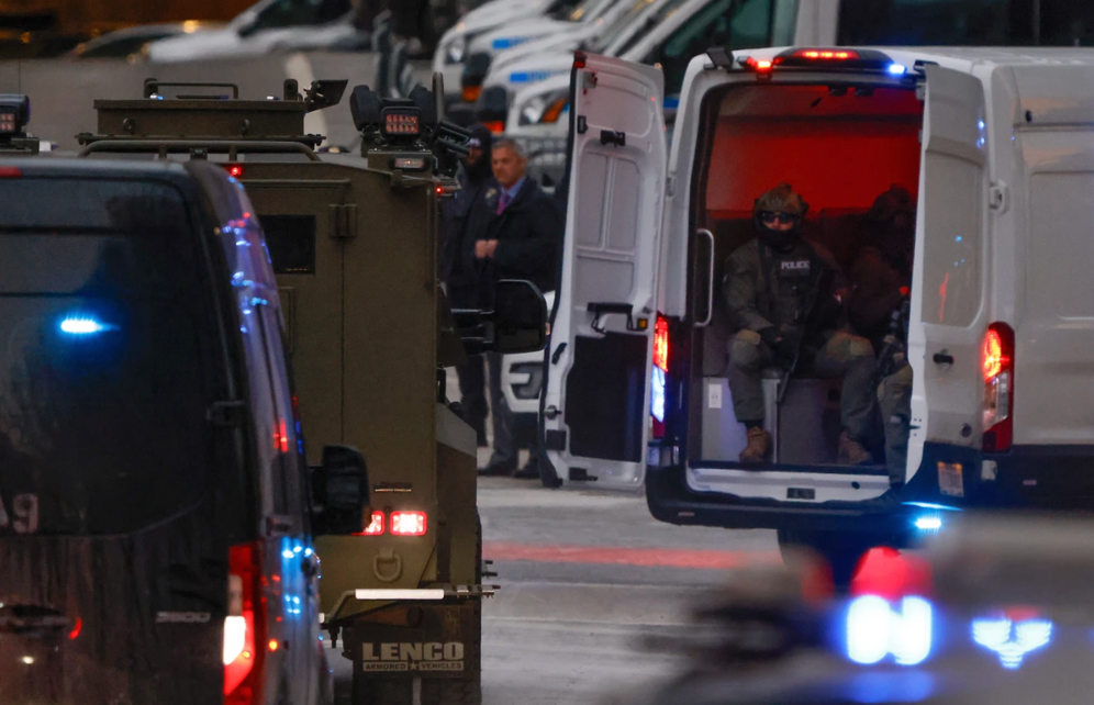 Federal agents escort an armored vehicle carrying Venezuelan President Nicolas Maduro and his wife Cilia Flores upon their arrival at the Manhattan federal courthouse on Monday, January 5, 2026, in New York.