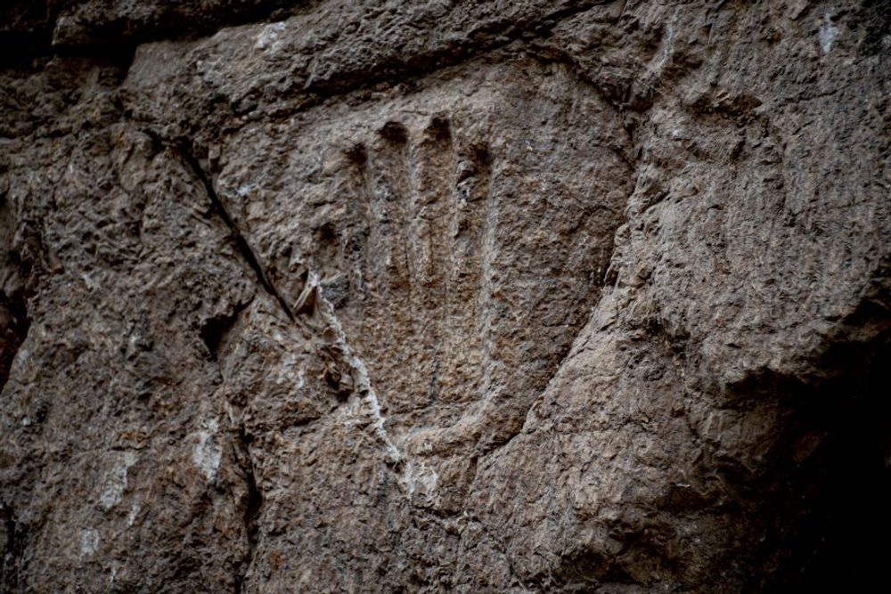 A mysterious handprint from the 10th century has been discovered in Jerusalem