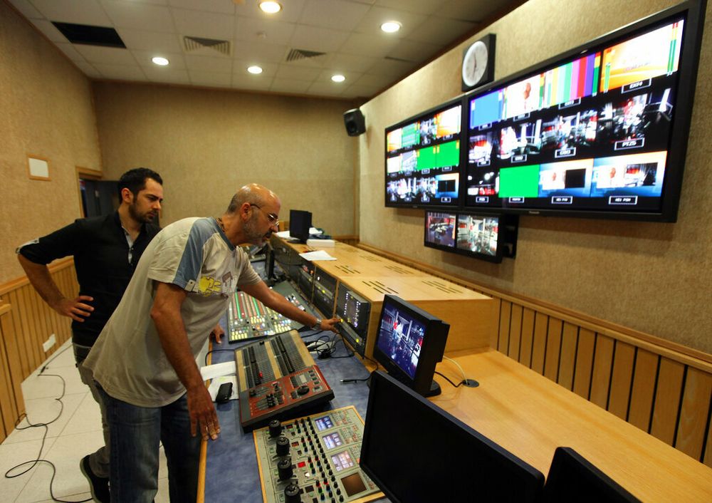 Staff members are preparing the newsroom of Al-Mayadeen, in Beirut, Lebanon