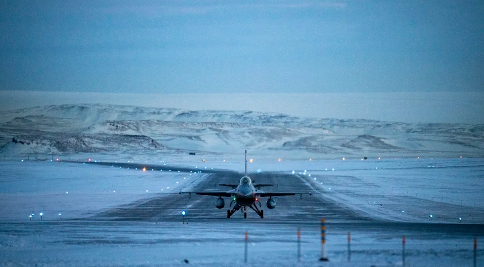 
Maj. Dylan Flynn and Capt. Jeff Weingast, F-16 Fighting Falcon pilots assigned to the 18th Fighter Interceptor Squadron from Eielson Air Force Base, Alaska, taxi their aircraft on the flightline during Operation NOBLE DEFENDER at Pittufik Space Base, Greenland, Jan. 31, 2025.