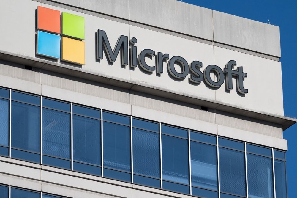 A sign outside a building with offices belonging to Microsoft is seen in Chevy Chase, Maryland, United States.