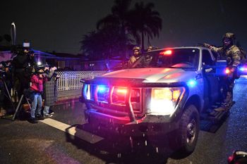 FBI officers leave the scene after responding to an address connected to Cole Tomas Allen, the shooting suspect at the White House Correspondents Dinner on Sunday, April 26, 2026, in Torrance, Calif