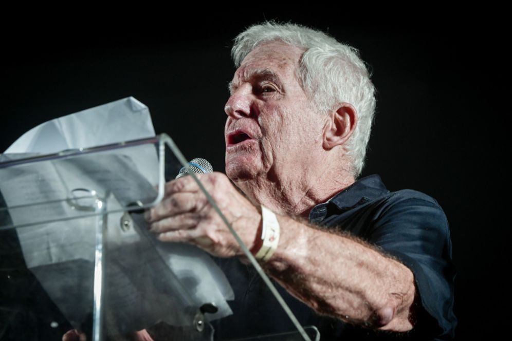 Amiram Levin speaks during a protest against the government's judicial reform.