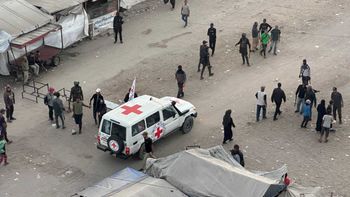 Red Cross vehicles waiting for instructions from Hamas as to where to go to pick up the hostages