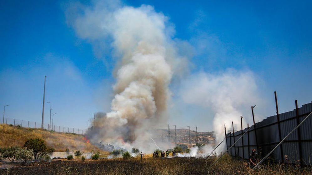 A fire in agricultural fields near the town of Huwara in the West Bank, after an alleged attack by Israeli settlers, June 6, 2026