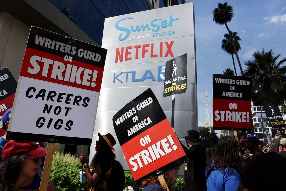 Striking Writers Guild of America members picket with striking SAG-AFTRA members outside Netflix studios on September 22, 2023 in Los Angeles, California.