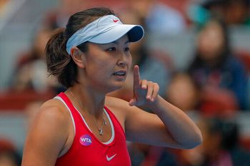 Chinese tennis player Peng Shuai reacts during her women's singles match at the China Open tennis tournament in Beijing, on October 5, 2016.
