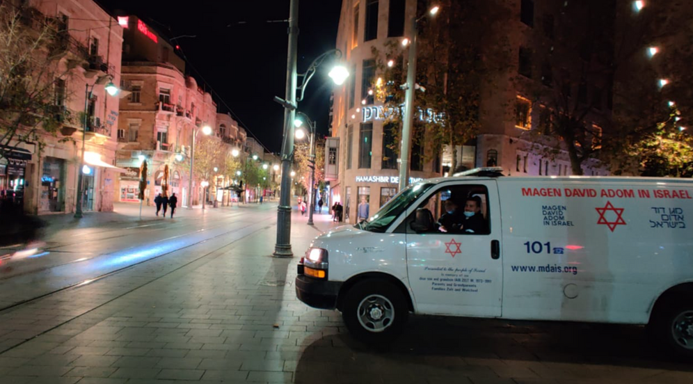 i24NEWS MDA ambulance parked in an almost empty Jerusalem street in downtown as Israel entered on December 27, 2020 its third national lockdown due to coronavirus cases rising over the past several weeks.