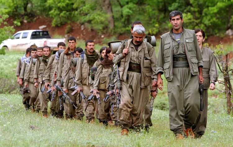 A group of armed Kurdish fighters from the Kurdistan Workers' Party in northern Iraq.
