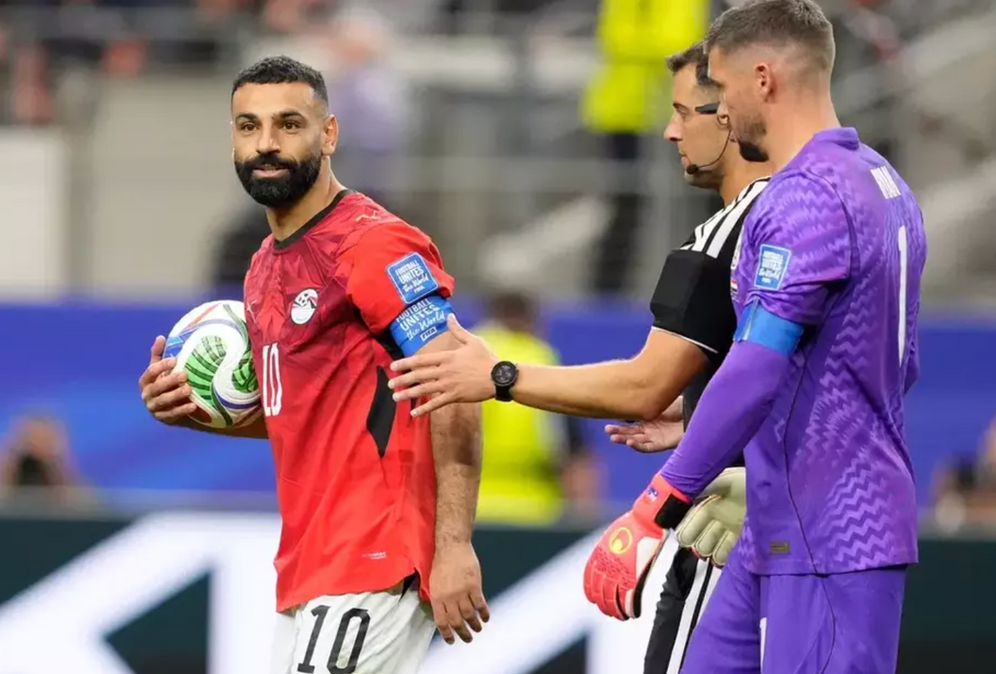 AP/Tony Gutierrez Mohamed Salah after having converted his penalty