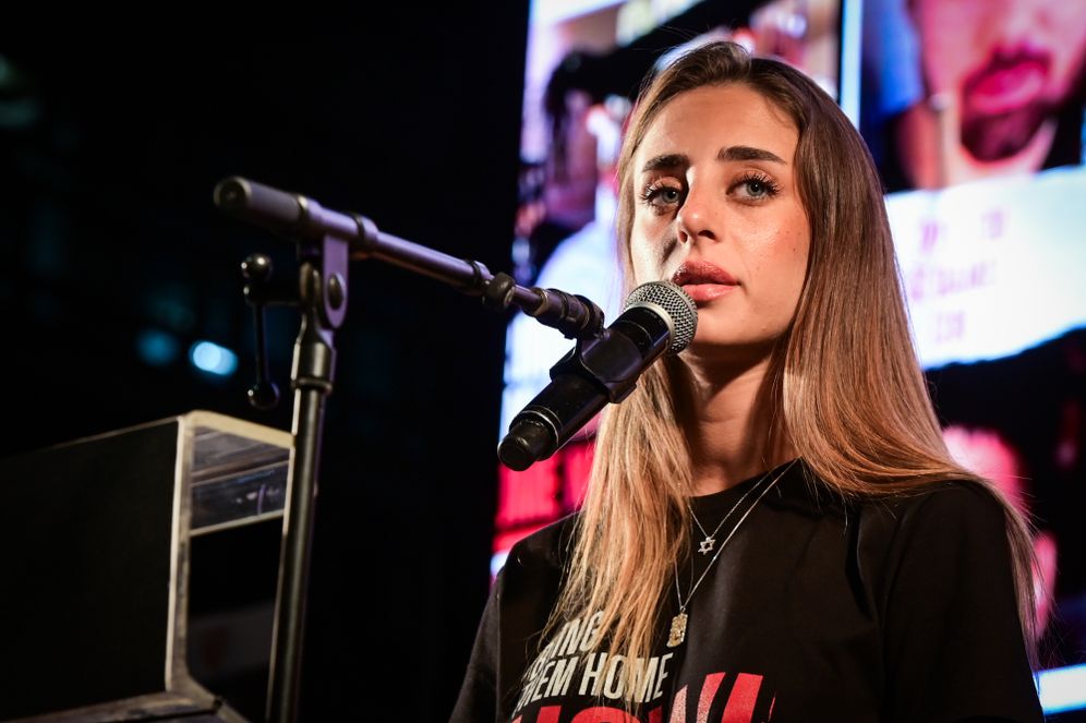 Photo by Avshalom Sassoni/Flash90 Former hostage Mia Schem speaks during a rally calling for the release of Israelis held hostage by Hamas terrorists in Gaza, at "Hostage Square" in Tel Aviv, May 17, 2025.