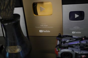 Plaques are displayed at the Teke Tek Medya news agency where imprisoned Turkish journalist Fatih Altayli continues to deliver comments on his YouTube show through letters read by his assistant, in Istanbul, Wednesday, Oct. 1, 2025. 