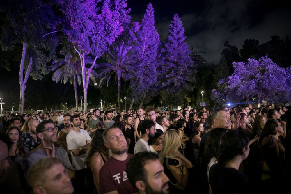 Israelis attending Tel Aviv's White Night all-night celebration event.