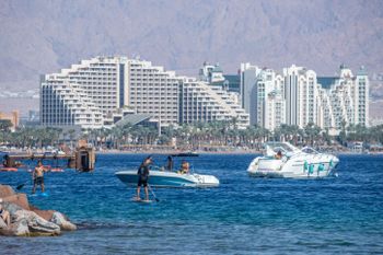 People enjoying the Red Sea in the Southern Israeli city of Eilat, on November 6, 2020.
