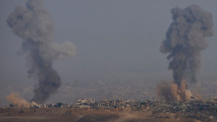 Smoke from an explosion rises in the northern Gaza Strip, as seen from southern Israel, on July 18, 2025. 
