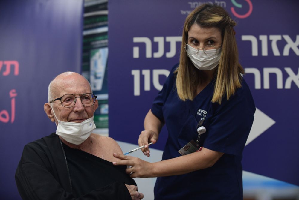 Heart transplant patients receive a 4th dose of the Covid vaccine, at the Sheba Medical Center, Israel, on December 31, 2021.