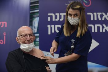 Heart transplant patients receive a 4th dose of the Covid vaccine, at the Sheba Medical Center, Israel, on December 31, 2021.