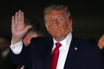 President Donald Trump gestures as he steps off Air Force One, early Tuesday, June 9, 2026, at Joint Base Andrews, Md. 
