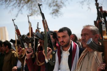 Houthi members attend the funeral procession of Houthi rebel fighters who were killed in fighting with Yemeni government forces, in Sanaa, Yemen, on November 24, 2021.