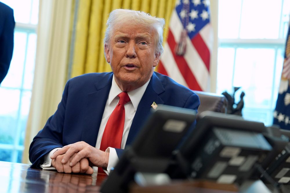 US President Donald Trump speaks after signing executive orders in the Oval Office of the White House