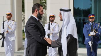This photo released by the official Syrian news agency SANA, shows United Arab Emirates President Sheikh Mohammed bin Zayed Al Nahyan, right, welcoming Syrian President Ahmad al-Sharaa in Abu Dhabi, United Arab Emirates, Sunday, April 13, 2025


