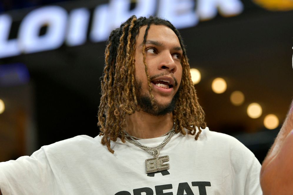 AP Photo/Brandon Dill) Memphis Grizzlies forward Brandon Clarke stands on the sideline in the first half of an NBA preseason basketball game against the Indiana Pacers Sunday, Oct. 8, 2023, in Memphis, Tenn