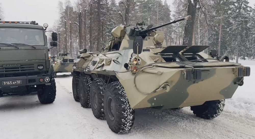 This handout image taken and released by the Russian Defence Ministry on January 6, 2021, shows Russian military vehicles waiting to depart to Kazakhstan at the Chkalovsky airport, outside Moscow, Russia.
