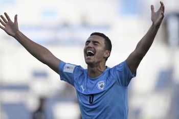 Israel's defender Or Israelov celebrates after defeating Brazil 3-2 in extra-time of the Argentina 2023 U-20 World Cup quarter-final football match between Israel and Brazil and qualifying to the semi-finals at the San Juan del Bicentenario stadium in San Juan, Argentina.